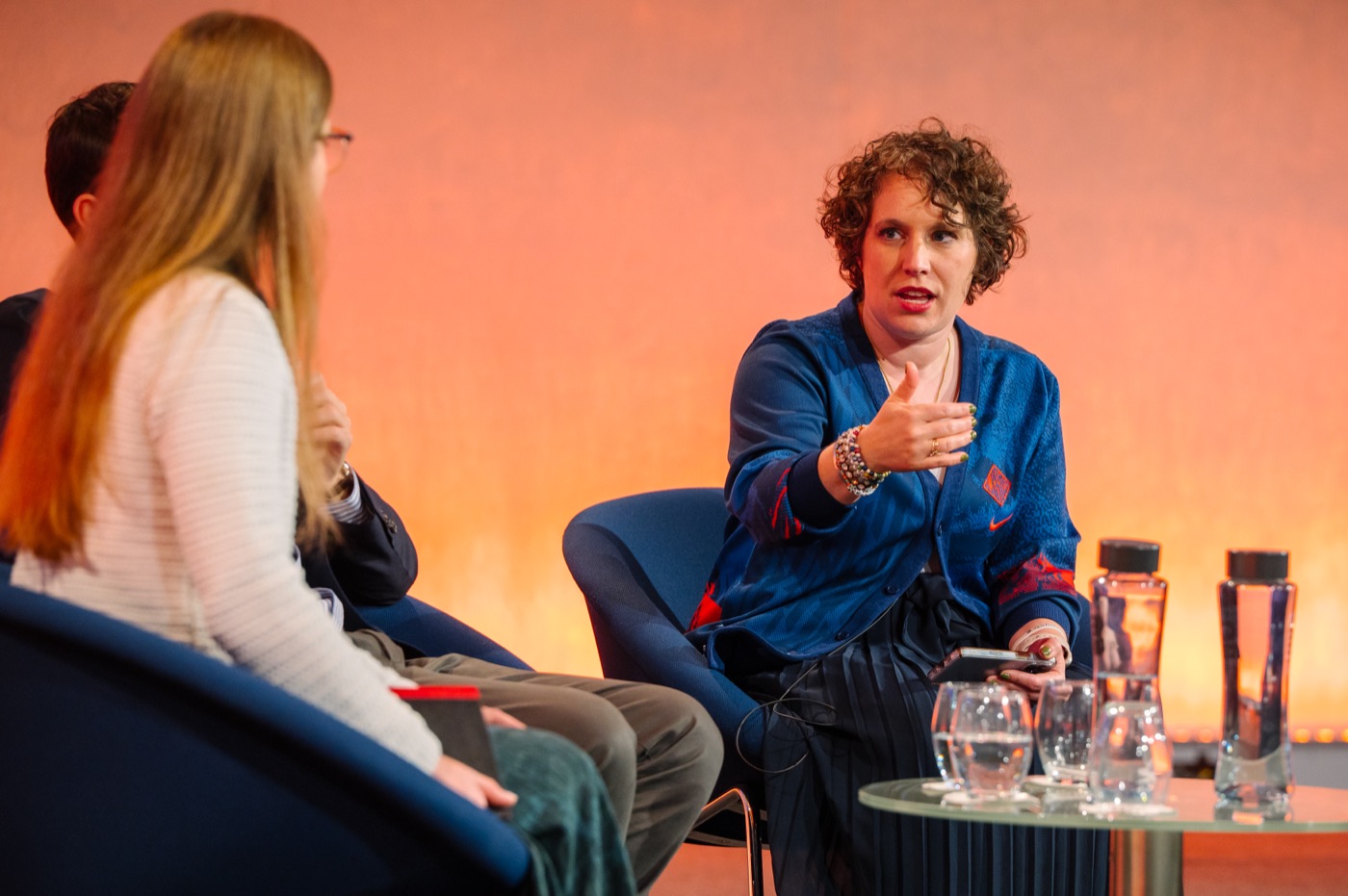 Lauren Teague in conversation on a panel at the Sport Positive Summit